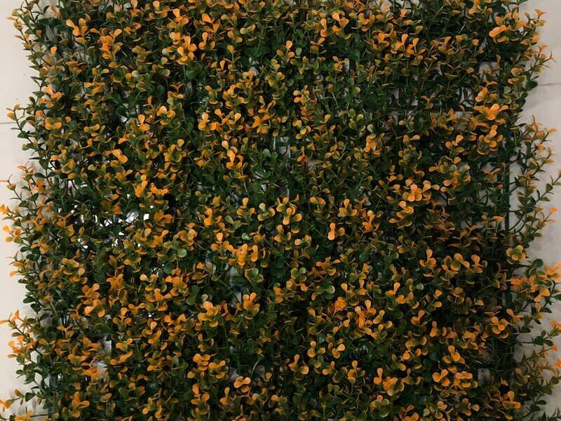 Jardín vertical hoja naranja